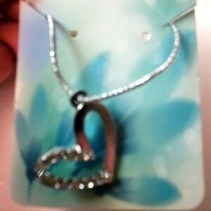 Handcrafted silvertone heart cord necklace